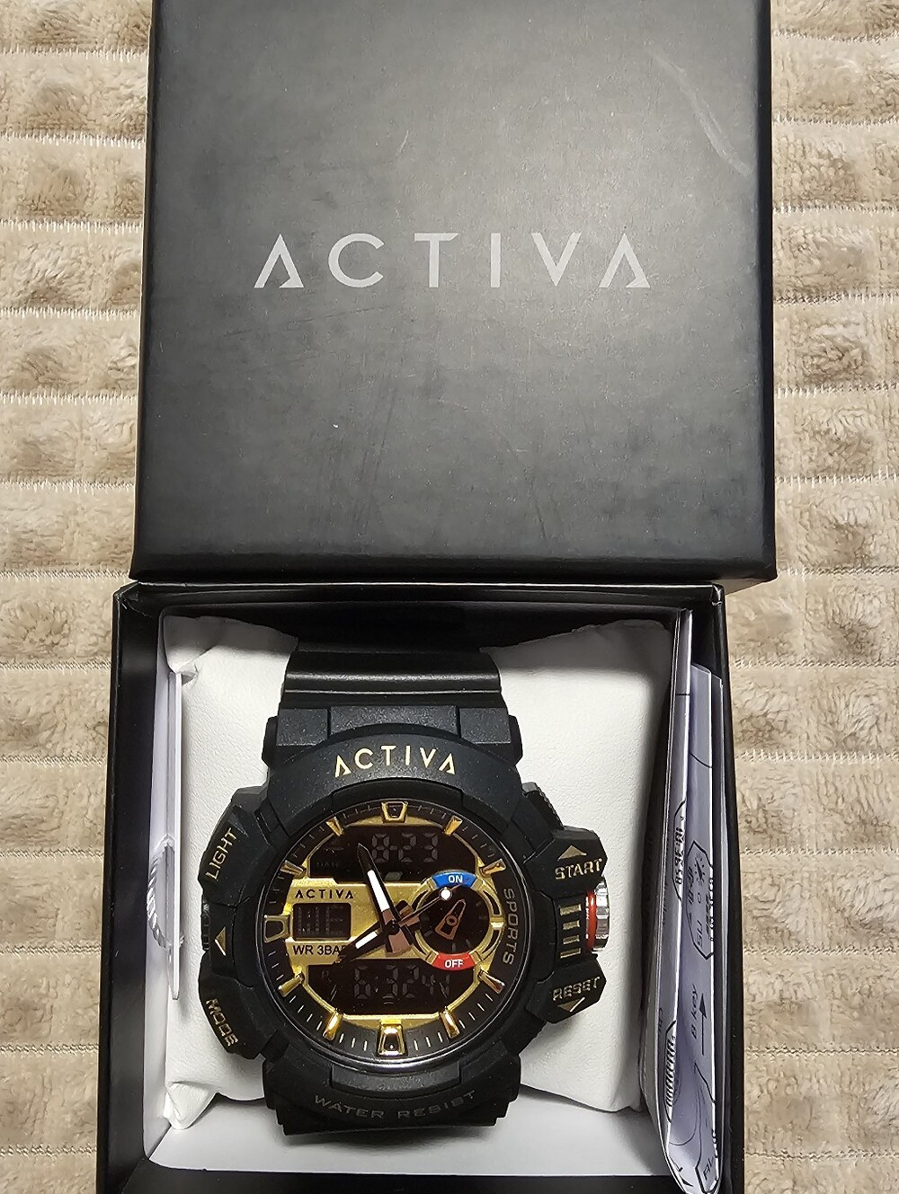 Invicta Black and Gold Sport Watch